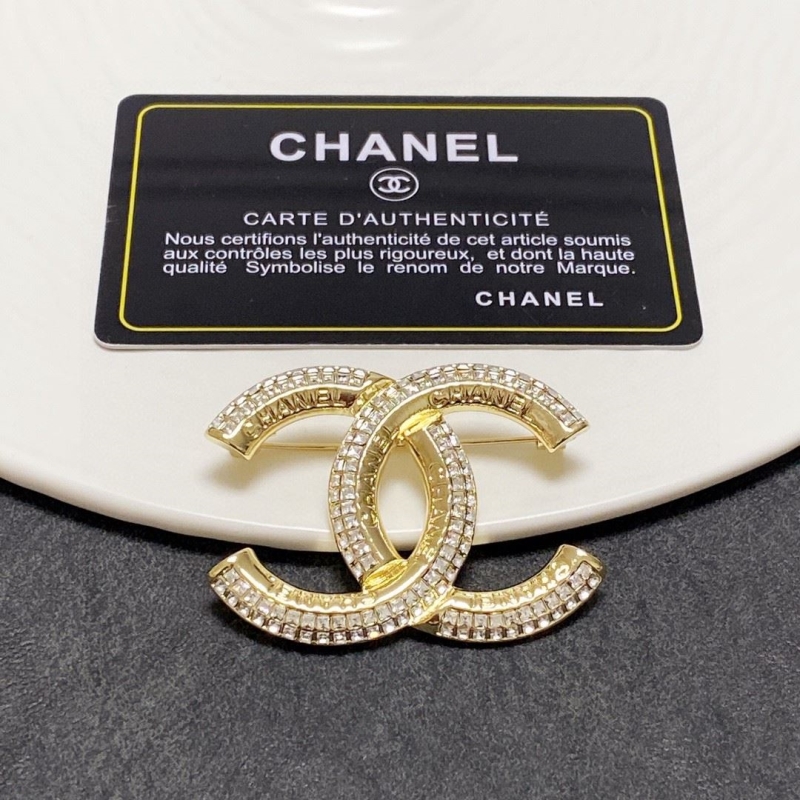 Ch*el brooches